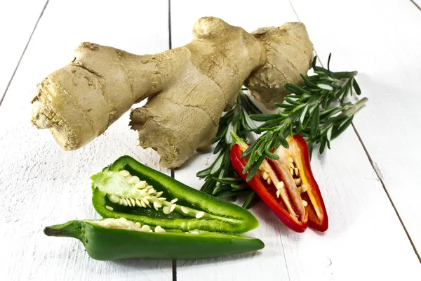 Fresh ginger rosemary and chilli pepers — Stock Photo, Image