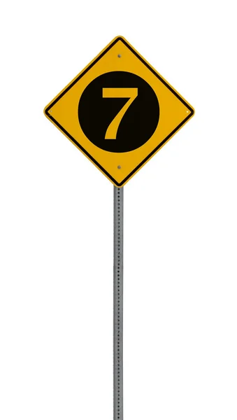 Na białym tle żółty znak ostrzegawczy jazdy, siedem — Zdjęcie stockowe