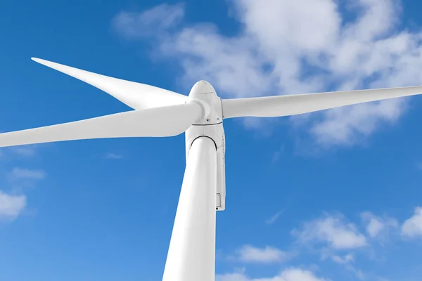 Wind turbine against blue cloudy sky. — Stock Photo, Image