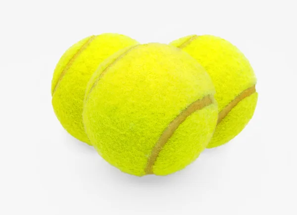 Three tennis balls on a white background — Stock Photo, Image
