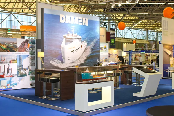 Stand shipbuilding company Damen at the exhibition Offshore Ener — Stock Photo, Image