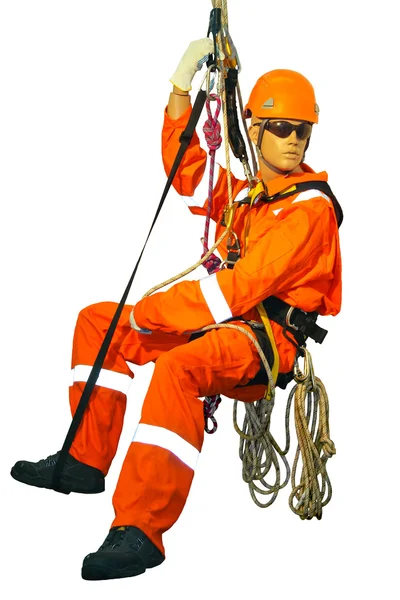 Mannequin in overalls steeplejack on a white background — Stock Photo, Image