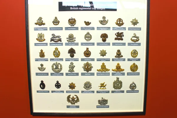 Insignia badges British Army at the Museum of the Battle of Norm — Stock Photo, Image