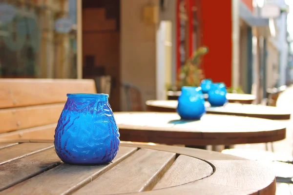 Candles on the tables of street cafe — Stock Photo, Image