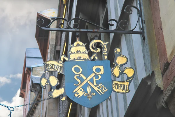 Restaurant signboard in the yard abbey of Mont Saint Michel. Nor — Stock Photo, Image