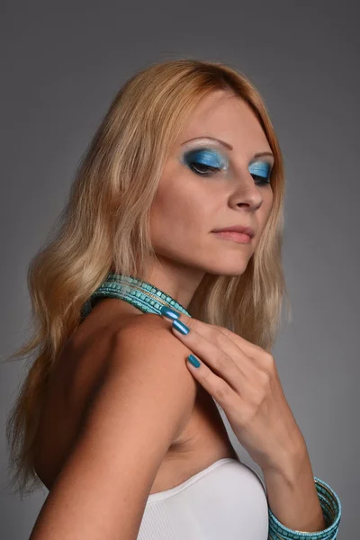 Studio portrait of a girl in blue — Stock Photo, Image