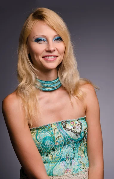 Studio portrait of a girl in blue — Stock Photo, Image