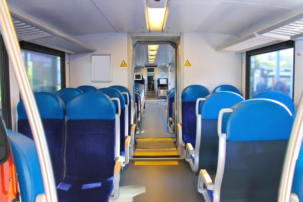 Rows of seats in a passenger train car. — Stock Photo, Image