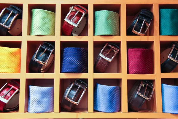 Large selection of ties and belts on sale — Stock Photo, Image