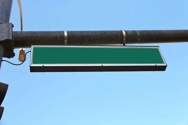 Green road sign on a city street — Stock Photo, Image