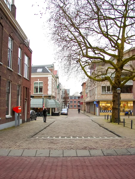 People walk in the Dutch town in Gorinchem. Netherlands. — Stock Photo, Image