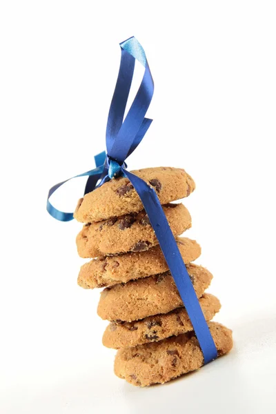 Gourmet cookies with blue ribbon — Stock Photo, Image