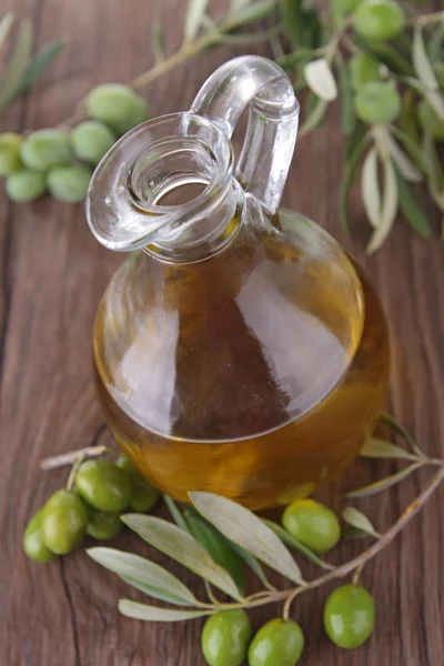 Green olive and carafe — Stock Photo, Image