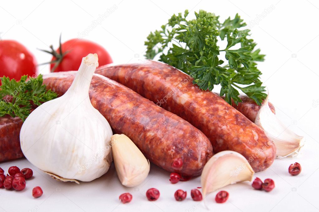 Raw sausages and ingredients