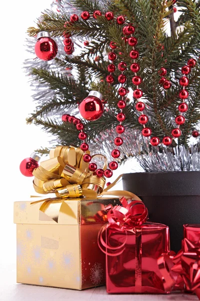 Christmas tree and present — Stock Photo, Image