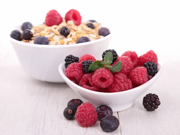 Fresh berries fruits and muesli — Stock Photo, Image