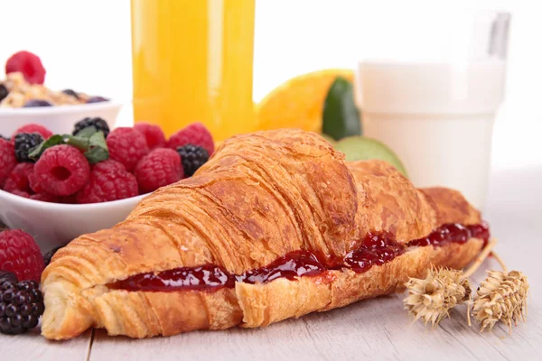 Close up on croissant with fruits — Stock Photo, Image