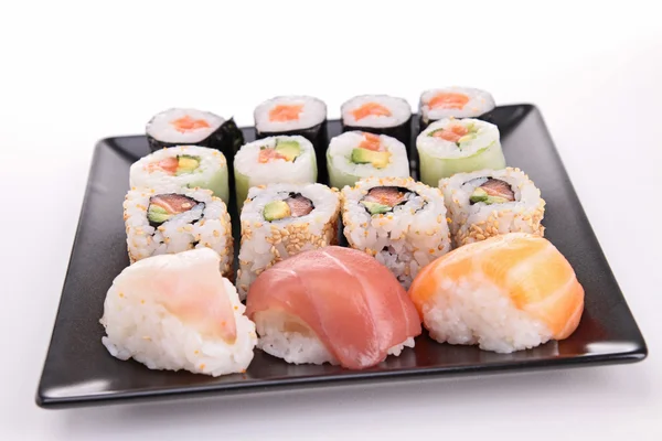 Surtido aislado de rollo de sushi maki —  Fotos de Stock