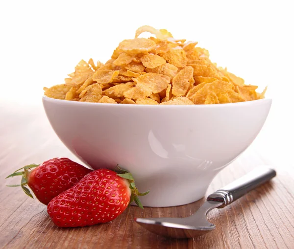 Skål med cornflakes med bær frugter - Stock-foto