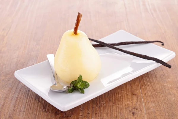 Poached pear with syrup — Stock Photo, Image