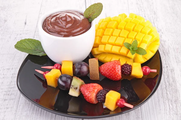 Salsa de chocolate y mango — Foto de Stock