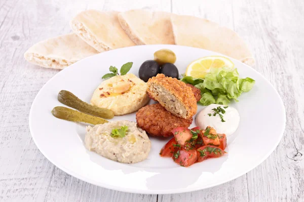 Falafel, spread and salad — Stock Photo, Image