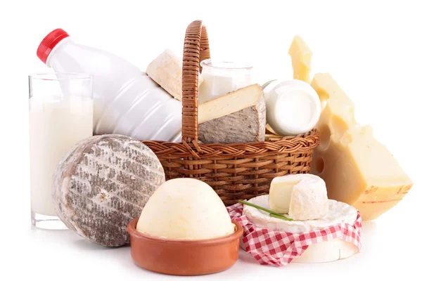 Wicker basket with dairy product — Stock Photo, Image