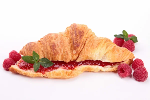 Croissant and raspberries — Stock Photo, Image