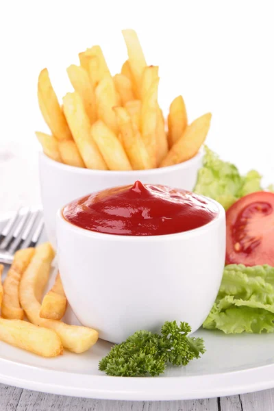 Французькі картопля й кетчуп — стокове фото