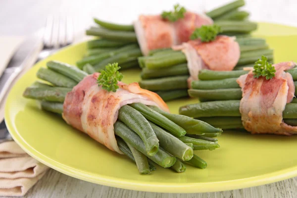 Green bean wrapped in bacon — Stock Photo, Image