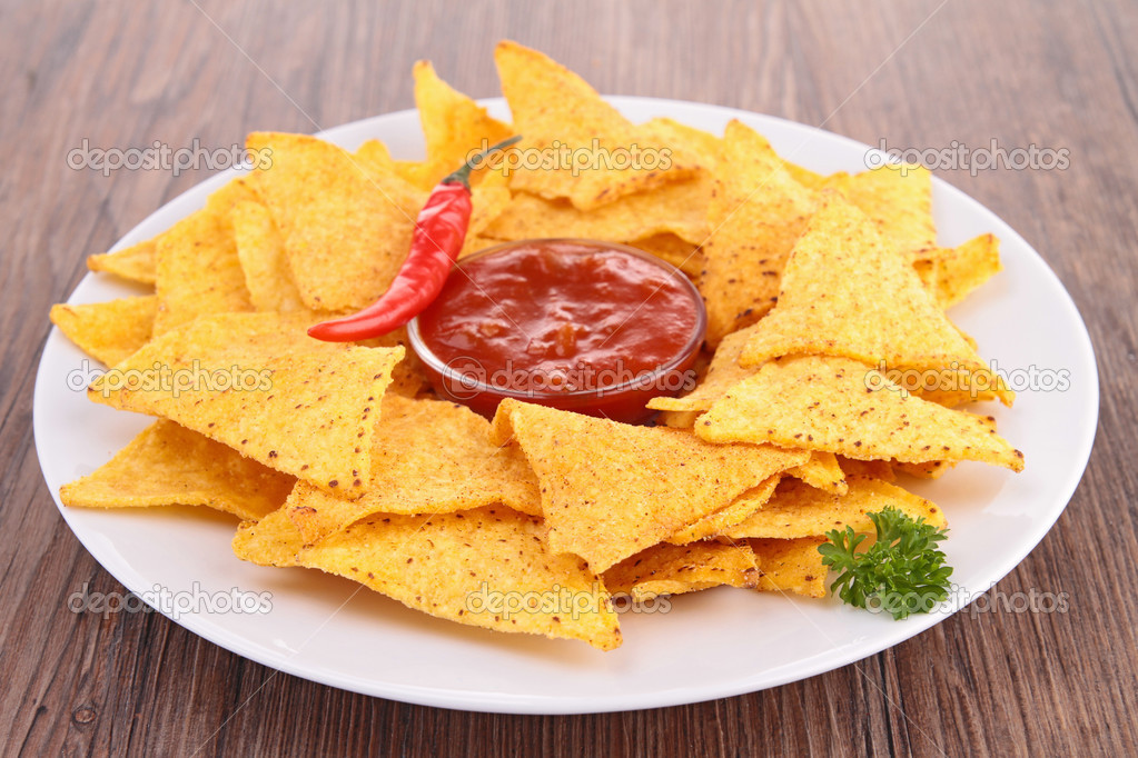 Corn tortilla chips with spicy sauce Stock Photo by ©studioM 25407221
