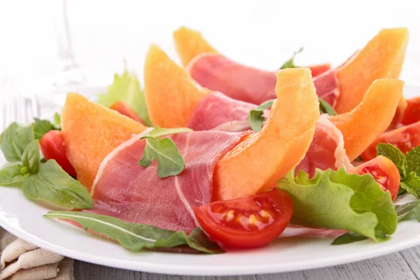 Melon, prosciutto an cherry tomato — Stock Photo, Image