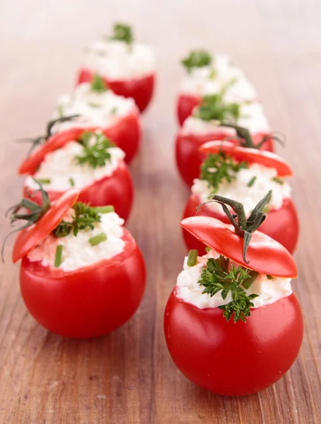 Stuffed tomato with cheese — Stock Photo, Image