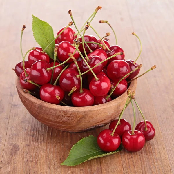Cherry fruit on wood — Stock Photo, Image