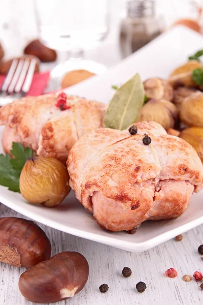 Cooked meat with chestnut and mushrooms — Stock Photo, Image