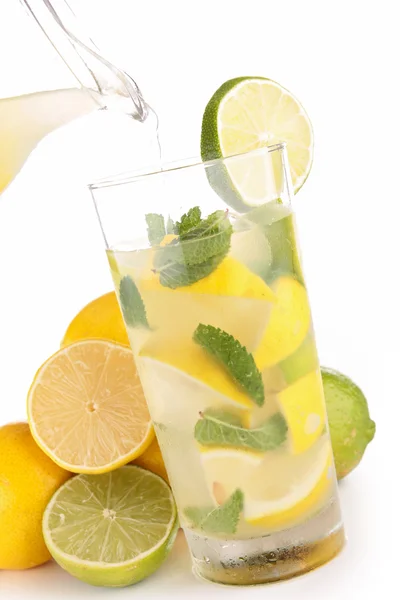 Cocktail with ice cube and lemon slice — Stok fotoğraf