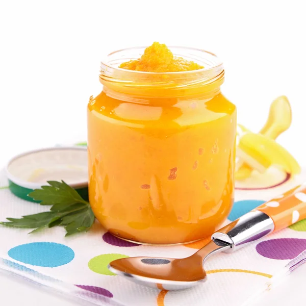 Jar of baby with carrot — Stock Photo, Image