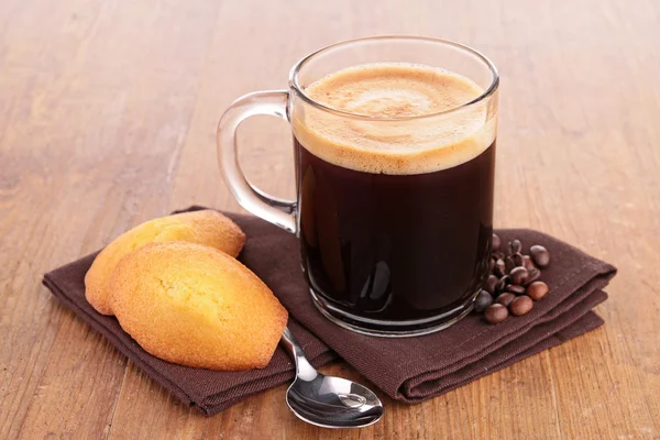 Coffee cup and madeleine — Stock Photo, Image