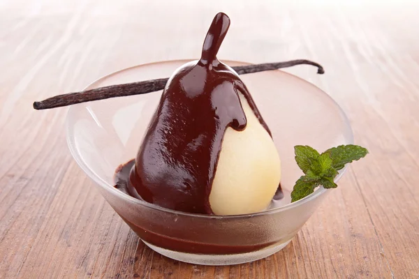 Poached pear with chocolate — Stock Photo, Image