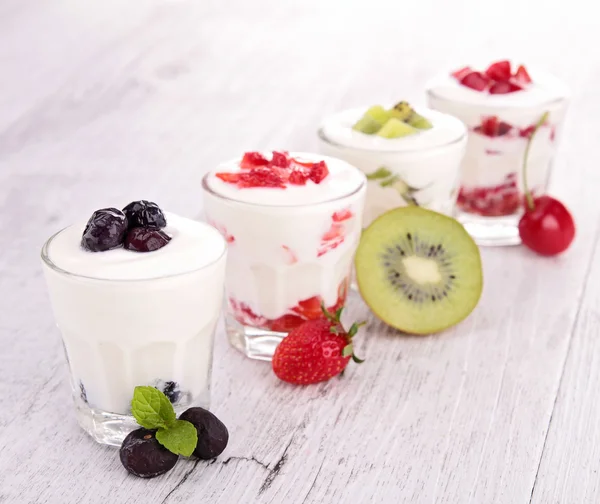 Assortment of fruit and yogurt — Stock Photo, Image