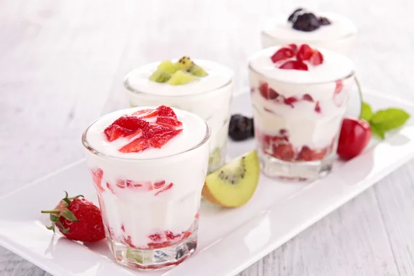Assortment of fruit and yogurt — Stock Photo, Image