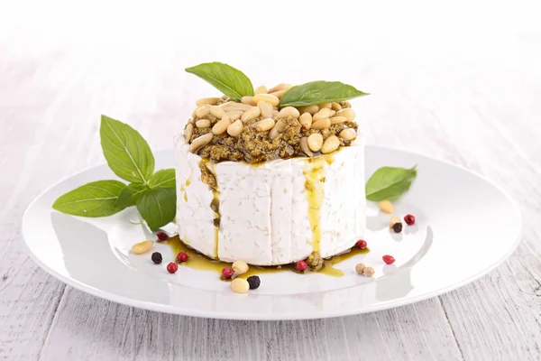 Cheese with pesto and pine nut — Stock Photo, Image