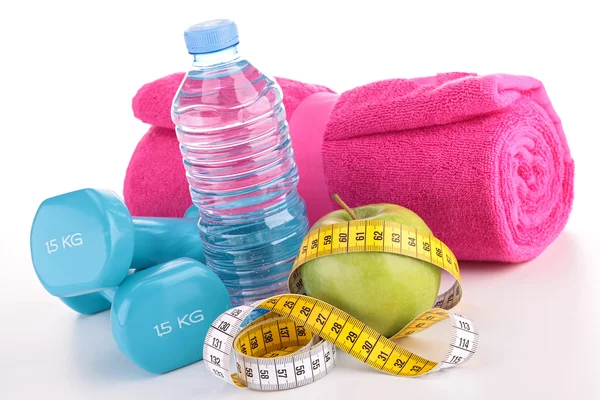 Dumbbell with green apple and water — Stock Photo, Image