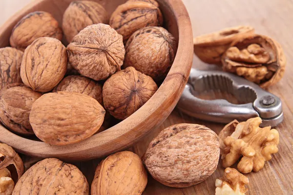 Walnut and nutcracker — Stock Photo, Image