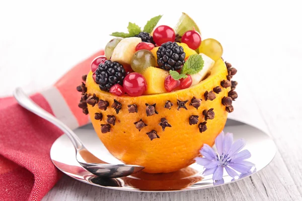 Fruit salad in orange bowl — Stock Photo, Image