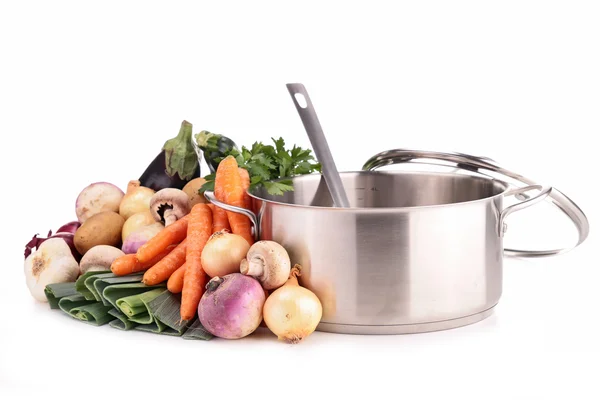 Pot and vegetables — Stock Photo, Image