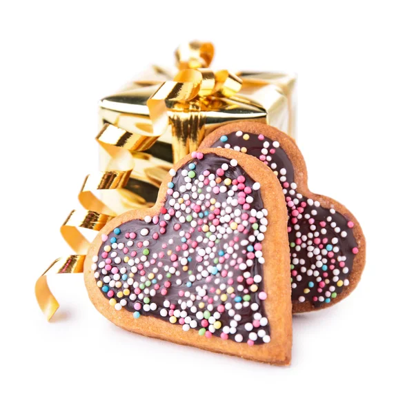 Gift with heart shape biscuit — Stock Photo, Image