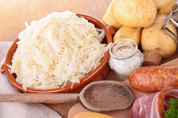 Sauerkraut and ingredients — Stock Photo, Image