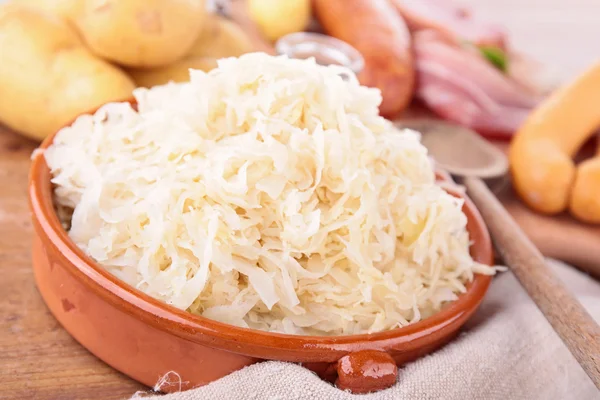 Sauerkraut and ingredients — Stock Photo, Image