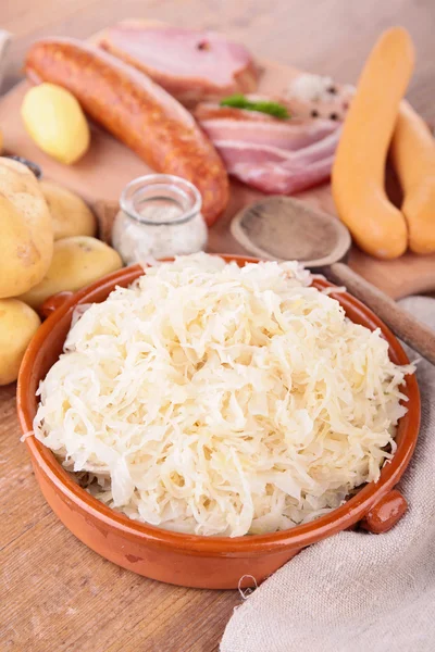 Sauerkraut and ingredients — Stock Photo, Image